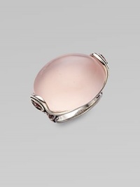 An elegant design with large rose quartz stone accented on the side with pink tourmaline, all set in sterling silver.Rose quartz, pink tourmalineSterling silverWidth, about 1Imported