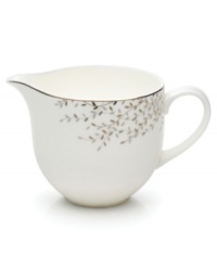 Fringed with shimmering leaves of platinum and mica, this bone china creamer turns your table into a springtime utopia. Its simply sleek shape is a vision of modern elegance in platinum-banded white. Fringed with shimmering leaves of platinum and mica, this bone china creamer turns your table into a springtime utopia. Its simply sleek shape is a vision of modern elegance in platinum-banded white.