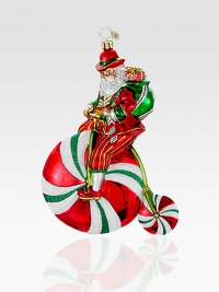Handcrafted from vibrant European glass, Santa shakes things up by riding a glittery, candy-coated unicycle. Hand-blownHand-painted7 tallMade in Poland Handcrafted from vibrant European glass, Santa shakes things up by riding a glittery, candy-coated unicycle. Hand-blownHand-painted7 tallMade in Poland