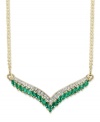 Enhance the glamour of an elegant v-neck gown. This v-shaped pendant necklace is adorned by marquise-cut emeralds (1-1/2 ct. t.w.) and a seamless row of round-cut diamonds (1/7 ct. t.w.). Crafted in 14k gold. Approximate length: 18 inches. Approximate drop length: 1 inch. Approximate drop width: 2-7/8 inches.