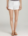Juicy Couture gets playful with tonal button detail in these cotton canvas shorts. Pair with a chic pair of sandals to finish.