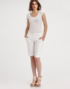 Clean lines shapes this slightly elongated silhouette of crisp stretch canvas.Mid-rise waistband Zip-fly Angled pockets Inseam, about 13 98% cotton/2% Lycra Dry clean Made in USA