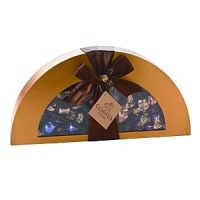 An abundance of holiday cheer, perfect for sharing with friends and family. Semicircle gift box contains a variety of individually-wrapped flavors to please every palate. An abundance of holiday cheer, perfect for sharing with friends and family. Semicircle gift box contains a variety of individually-wrapped flavors to please every palate.