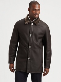 Supple leather, accented with elegant metal clasp closures and enhanced by a plush shearling collar.Shearling foldover point collarClasp closuresSide slash pocketsFully linedAbout 35 from shoulder to hemLambskin leatherDry clean by leather specialistMade in Italy Supple leather, accented with elegant metal clasp closures and enhanced by a plush shearling collar.Shearling foldover point collarClasp closuresSide slash pocketsFully linedAbout 35 from shoulder to hemLambskin leatherDry clean by leather specialistMade in Italy