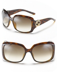 Chic rectangle sunglasses with Gucci's new logo at temples. Chic rectangle sunglasses with Gucci's new logo at temples.