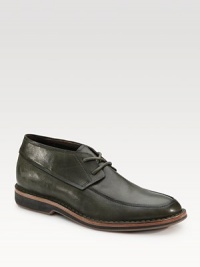 An elegant boot is constructed in hand-painted leather with stitch-out detail and patented Nike technology for on-your-feet ease. Partial leather lining Padded insole Rubber sole Imported An elegant boot is constructed in hand-painted leather with stitch-out detail and patented Nike technology for on-your-feet ease. Partial leather lining Padded insole Rubber sole Imported