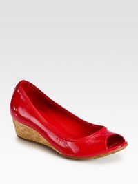 Comfy-chic cork wedge with a glossy patent leather upper and peep toe. Cork wedge, 1½ (40mm)Patent leather upperLeather liningRubber solePadded insoleImportedOUR FIT MODEL RECOMMENDS ordering true size. Comfy-chic cork wedge with a glossy patent leather upper and peep toe. Cork wedge, 1½ (40mm)Patent leather upperLeather liningRubber solePadded insoleImportedOUR FIT MODEL RECOMMENDS ordering true size.