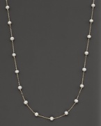 Beaded 14 Kt. white gold necklace with fresh water pearl stations.