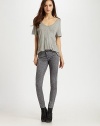 Body-skimming stretch denim reverses to a contrast shade for versatile looks.Mid-rise waistZip-flyFaux front pocketsRise, about 8Inseam, about 3095% cotton/2% elasterell/3% spandexMachine washMade in USA of imported fabric