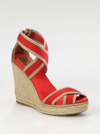 Classic canvas design with a hemp wedge and embedded leather logo detail. Hemp-covered wedge, 5 (125mm)Hemp-covered platform, 1 (25mm)Compares to a 4 heel (100mm)Canvas and leather upperCanvas liningRubber soleImportedOUR FIT MODEL RECOMMENDS ordering true whole size; ½ sizes should order the next whole size down. Classic canvas design with a hemp wedge and embedded leather logo detail. Hemp-covered wedge, 5 (125mm)Hemp-covered platform, 1 (25mm)Compares to a 4 heel (100mm)Canvas and leather upperCanvas liningRubber soleImportedOUR FIT MODEL RECOMMENDS ordering true whole size; ½ sizes should order the next whole size down.