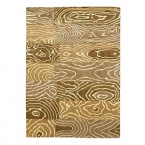 The Pokhara Collection features sophisticated geometric and Nepalese designs that are saturated in dramatic earth-inspired colorations.