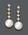 Perfect your evening wear with elegant drops. Belle de Mer earrings features a cultured freshwater pearl (8-9 mm) highlighted by four, round-cut diamonds (1/3 ct. t.w.). Crafted in 14k gold. Approximate drop: 3/4 inch.