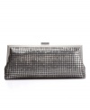 A glam accessory for the little black dress, this chain-mail clutch features a vintage final touch: a frame silhouette.