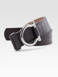 An elegant design in calfskin leather, stamped with the the house of Ferragamo's signature gancino design. Ruthenium buckle1½ wideMade in Italy