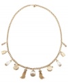 Simply charming. Carolee's trendy and tasteful long necklace is adorned by glass pearls and tassel charms. Set in antique gold tone mixed metal. Approximate length: 34 inches. Approximate drop: 1-1/4 inches.