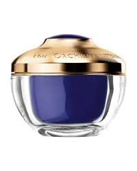 The neck and décolleté are, after the face, the two zones that are the most sensitive to the effects of aging. Because the skin is naturally thinner, the neck and décolleté are prime targets for the premature appearance of wrinkles and pigmentation flaws. The Orchidée Impériale Neck and Décolleté Cream is a rich creme that redefines and enhances the delicate neck and décolleté area. Its re-densifying action is reinforced by a double anti-slackening effect. After the treatment, the neck and décolleté appear immediately smoothed, as if lifted. Spots are diminished and the décolleté recovers a satiny radiance. With continued use, the skin recovers its strength and tone; it appears denser, stronger, and firmer. The neck and décolleté are, after the face, the two zones that are the most sensitive to the effects of aging. Because the skin is naturally thinner, the neck and décolleté are prime targets for the premature appearance of wrinkles and pigmentation flaws. The Orchidée Impériale Neck and Décolleté Cream is a rich creme that redefines and enhances the delicate neck and décolleté area. Its re-densifying action is reinforced by a double anti-slackening effect. After the treatment, the neck and décolleté appear immediately smoothed, as if lifted. Spots are diminished and the décolleté recovers a satiny radiance. With continued use, the skin recovers its strength and tone; it appears denser, stronger, and firmer.