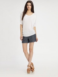 Comfy, everyday boatneck has dropped shoulders and trendy three-quarter dolman sleeves. BoatneckDropped shouldersThree-quarter dolman sleevesRayonDry cleanImportedModel shown is 5'10 (177cm) wearing US size Small. Comfy, everyday boatneck has dropped shoulders and trendy three-quarter dolman sleeves. BoatneckDropped shouldersThree-quarter dolman sleevesRayonDry cleanImportedModel shown is 5'10 (177cm) wearing US size Small.