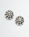A simply chic design encrusted in sparking crystals. CrystalsGlassRhodium-platedSize, about .55Post backImported 