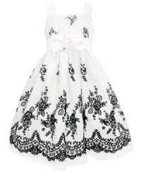 She'll steal the spotlight in this dreamy, floral-adorned creation by Jayne Copeland. She'll steal the spotlight in this dreamy, floral-adorned creation by Jayne Copeland.