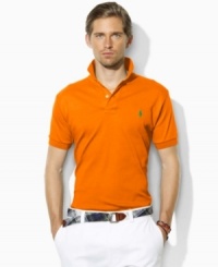 A classic short-sleeved polo shirt is cut for a relaxed, comfortable fit in smooth, soft cotton interlock. A classic short-sleeved polo shirt is cut for a relaxed, comfortable fit in smooth, soft cotton interlock.