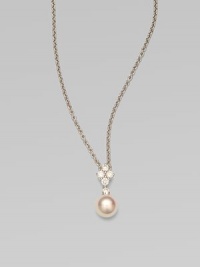 Five dazzling diamonds accent this round Akoya pearl pendant on a sleek 18k white gold link chain. 8MM white, round, Akoya pearlDiamonds, .35 tcwLength, about 18Pendant size, about 1¾ Lobster clasp closureImported Five dazzling diamonds accent this round Akoya pearl pendant on a sleek 18k white gold link chain. 8MM white, round, Akoya pearlDiamonds, .35 tcwLength, about 18Pendant size, about 1¾ Lobster clasp closureImported