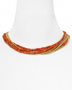 Let MICHAEL Michael Kors lend every look a colorful touch with this beaded coral and gold tone bib necklace. It's bold layered look instantly enlivens your neckline.