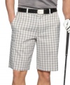 Keep your cool cruising the green in these plaid shorts from Greg Norman for Tasso Elba.