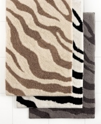Go wild! Turn your bathroom into a chic safari with this Zebra bath rug from Charter Club, featuring a bold zebra-inspired pattern in three neutral color palettes to coordinate with any bath decor. Quick drying finish, ultra-absorbency and no-slip latex backing complete this plush rug. Go wild! Turn your bathroom into a chic safari with this Zebra bath rug from Charter Club, featuring a bold zebra-inspired pattern in three neutral color palettes to coordinate with any bath decor. Quick drying finish, ultra-absorbency and no-slip latex backing complete this plush rug.