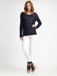 Open-stitch cotton boatneck with dropped shoulders and long dolman sleeves. BoatneckDropped shouldersLong dolman sleevesCottonDry cleanImported