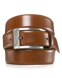 Sleek, brown dress belt with silvertone, brushed buckle. Hugo Boss engraved on buckle. Sleek, brown dress belt with silvertone, brushed buckle. Hugo Boss engraved on buckle.