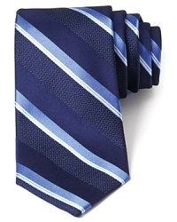 Luxurious refinement with a bit of texture in plush silk, cut in a classic width for an always-handsome look. Luxurious refinement with a bit of texture in plush silk, cut in a classic width for an always-handsome look.