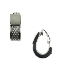 Traditional hoops with a stylish edge. AK Anne Klein earrings feature a textured chain center set in a silver tone mixed metal hoop setting. Approximate diameter: 3/4 inch. Traditional hoops with a stylish edge. AK Anne Klein earrings feature a textured chain center set in a silver tone mixed metal hoop setting. Approximate diameter: 3/4 inch.