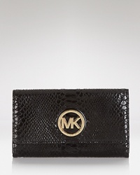 This effortless wallet captures the cosmopolitan essence of MICHAEL Michael Kors with its slim profile and sophisticated leather. This effortless wallet captures the cosmopolitan essence of MICHAEL Michael Kors with its slim profile and sophisticated leather.