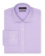 A modern dress shirt for the modern man, featuring an inspired check pattern and a contemporary silhouette.