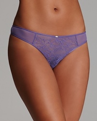 A floral lace hipster with sheer lace trim along legs.