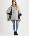 Supremely soft, cable-knit cape of pure cotton, updated by a funnelneck, front zipper and convenient slash pockets. FunnelneckFront zipperCape sleevesSlash pocketsAbout 29 from shoulder to hemCottonMachine washMade in Italy of imported fabricModel shown is 5'10 (177cm) wearing US size Small.