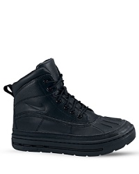 Rugged and decked out to take on the cold weather, the Nike Woodside 2 High Boys' Boot has a water-resistant upper and soft, warm lining for lasting comfort. Rugged and decked out to take on the cold weather, the Nike Woodside 2 High Boys' Boot has a water-resistant upper and soft, warm lining for lasting comfort.