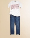 A super sized, dazzling, sequined WOW! decorates the front of this pretty tee with short dolman sleeves.Round banded necklineShort dolman sleevesVertical hem70% polyester/26% rayon/4% spandexHand washMade in USA
