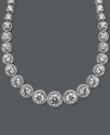 A chic collar perfect for cocktail hour. Arabella's dazzling design highlights dozens of round-cut Swarovski zirconias (55-1/3 ct. t.w.) set in sterling silver. Approximate length: 17 inches.