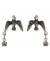 Free-flying style by Betsey Johnson. These silvertone mixed metal earrings feature crystal accents. Approximate drop: 1 inch.