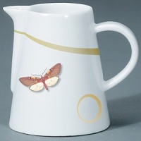 For over two centuries Raynaud has created unique Limoges porcelain, with a marked preference for relief shapes and generously colored and gilt decorations. Metamorphoses is a striking pattern of red and gold with a butterfly motif. For over two centuries Raynaud has created unique Limoges porcelain, with a marked preference for relief shapes and generously colored and gilt decorations. Metamorphoses is a striking pattern of red and gold with a butterfly motif.
