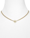 Pair this tiny MARC BY MARC JACOBS pendant necklace with one or two other necklaces for a lovely, layered look.