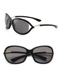 A sleek design with a semi-floating lens accented with barrel temples. Available in shiny black with grey polarized lens or brown with brown lens. Barrel temples100% UV protectionMade in Italy A sleek design with a semi-floating lens accented with barrel temples. Available in shiny black with grey polarized lens or brown with brown lens. Barrel temples100% UV protectionMade in Italy