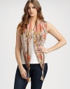 This square-shaped scarf features a gorgeous design in full bloom.Tassel detailsAbout 42 X 42SilkHand washImported
