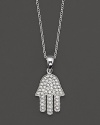 This protective Hamsa pendant is set in pave diamonds and 14 Kt. white gold.