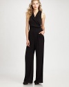 A draped neckline and flattering sash give this silk jumpsuit with a hint of stretch, a beyond-feminine look.Draped v-neckSleevelessPleat details at waistSelf-tie beltConcealed back zipperFully linedAbout 59 from shoulder to hemSilk/spandexDry cleanImported Model shown is 5'10 (177cm) wearing US size 4. OUR FIT MODEL RECOMMENDS ordering true size. 