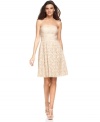 A classic look that's also completely on-trend: Vince Camuto's strapless dress mingles lace with pleated details for a beautiful feminine effect. (Clearance)