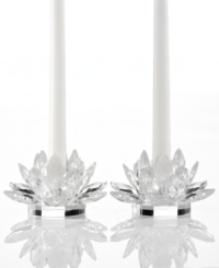 Votives in bloom. Lighting by Design Lotus blossoms brighten your home with warm, flickering candlelight and the resplendent shine of faceted crystal. A stunning pair for the dining room or holiday table. Votives in bloom. Lighting by Design Lotus blossoms brighten your home with warm, flickering candlelight and the resplendent shine of faceted crystal. A stunning pair for the dining room or holiday table.