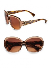 THE LOOKRounded style Translucent plastic framesLogo etched lens T logo temples Tonal striped armsLogo ear tips Signature case includedTHE COLORBrown with brown gradient lensesORIGINMade in Italy THE LOOKRounded style Translucent plastic framesLogo etched lens T logo temples Tonal striped armsLogo ear tips Signature case includedTHE COLORBrown with brown gradient lensesORIGINMade in Italy