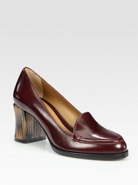 A wooden block heel adds contemporary style to this loafer-inspired closet staple of fine leather. Wooden heel, 2¾ (70mm)Leather upperLeather lining and solePadded insoleMade in ItalyOUR FIT MODEL RECOMMENDS ordering one half size up as this style runs small. A wooden block heel adds contemporary style to this loafer-inspired closet staple of fine leather. Wooden heel, 2¾ (70mm)Leather upperLeather lining and solePadded insoleMade in ItalyOUR FIT MODEL RECOMMENDS ordering one half size up as this style runs small.